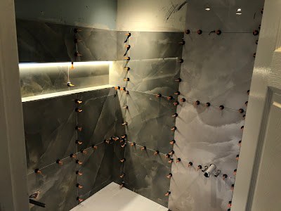 Tiling on a levelling system during a bathroom renovation